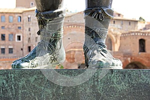 Antique Cesar statue, detail shot of the boots