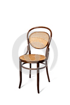 Antique chair on white background. Beech bentwood furniture with caned seat and backrest. Michael Thonet chair number 11 made of