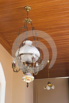 Antique chandelier on wood palate.