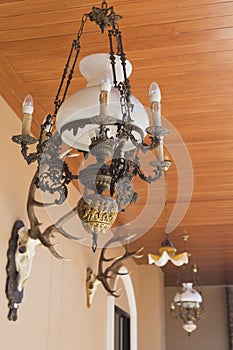 Antique chandelier on wood palate.