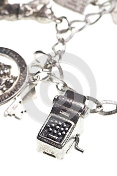 Antique charm bracelet with typewriter photo