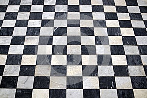 Antique checkered marble floor, black and white tiles