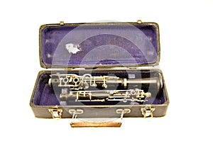 Antique clarinet musical instrument in old grunge case