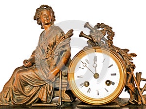 Antique clock with brass woman sitting and music instruments