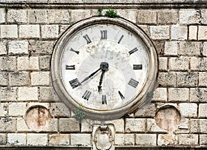 Antique clock on a building.