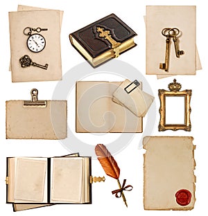 Antique clock, key, postcard, photo album, feather pen