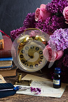 Antique clock with pile of mail