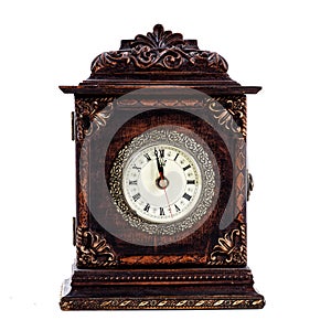 Antique clock about to hit midnight or noon photo