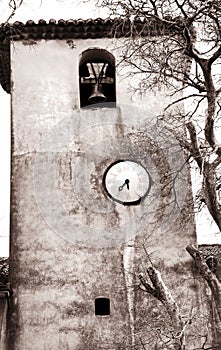 Antique clock tower in France photo