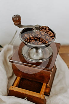 Antique coffee grinder with coffee