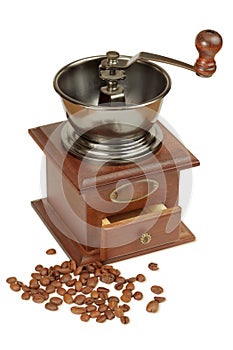 Antique coffee grinder and coffee beans