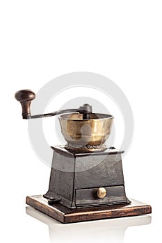 Antique coffee grinder isolated on white background