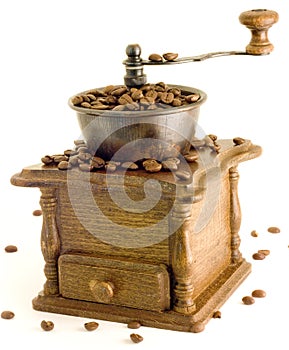 Antique coffee mill on the white background