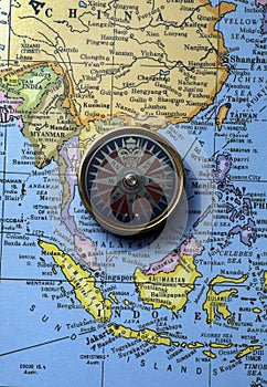 Antique compass on map (South East Asian Region)