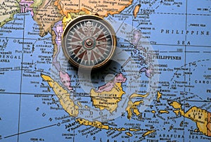 Antique compass on map (South East Asian Region)