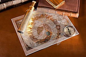Antique compass and old map