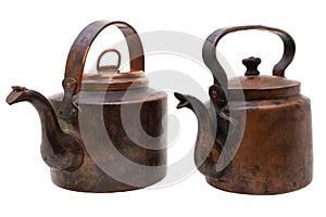 Antique copper kettles isolated on white