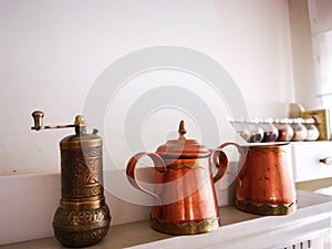 Antique copper vessels - kettle and manual grinding