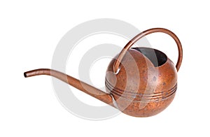 Antique copper watering can isolated against white