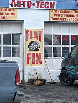 Antique countryside auto mechanic shop with antique signs
