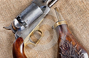 Antique Cowboy Pistol and Gunpowder Flask