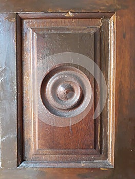 Antique dark brown wooden rustic door in Germany