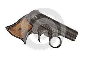 Antique derringer pistol isolated.