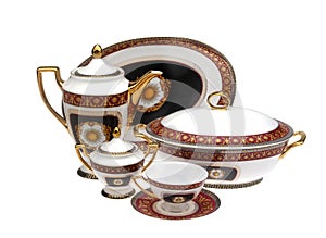 Antique dinner and coffee set with soup pot, plates, coffee cup and milk cup