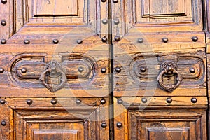 Antique door handle with a nice old wooden door detail