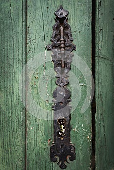 Antique door lock in black ironmongery photo