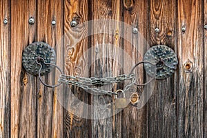 The Antique doorknob and the lock on the chain