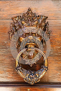 Antique doorknocker in the Provence, France