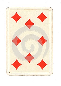 An antique eight of diamonds playing card.