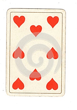 An antique eight of hearts playing card.