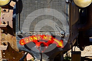 Antique Farm tractor waits for the children