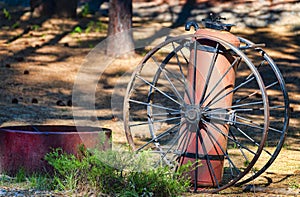 Antique Fire Extinguisher and Wagon Wheels