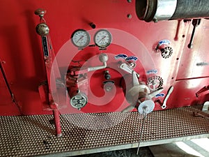 Antique fire truck pump gauges and valves