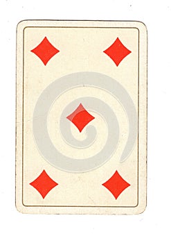 An antique five of diamonds playing card.