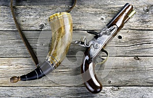 Antique Flintlock Pistol and Gunpowder Horn