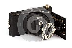 Antique fold away camera on white