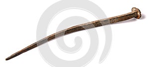 Antique forged nail is isolated on a white background