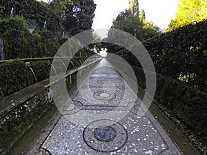 Antique fountain in the park hundered fountains at Villa D`Este in Tivoli. Walk a hundred fountains at the Villa d`Este.