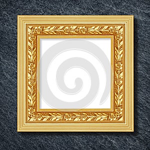 The antique frame on Dark grey black slate background or texture,glod frame