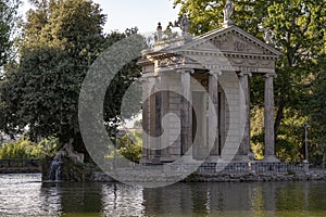 Antique gate in Roma Italia Rome Italy over the lake photo