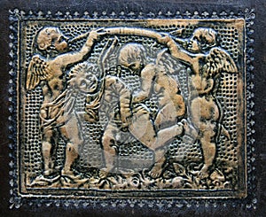 Antique gilded cupids