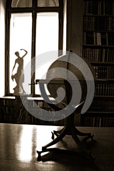 Antique Globe and Statue