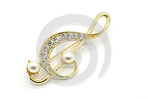 Antique Gold clef Broach on White Background