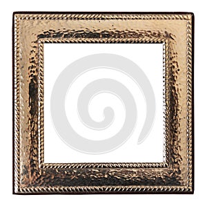 Antique golden frame isolated on white background. Old metal frame with carvings painted with gold paint.