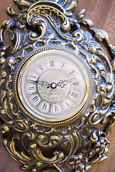 Antique goldish clock.