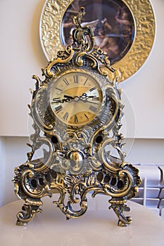 Antique goldish clock.